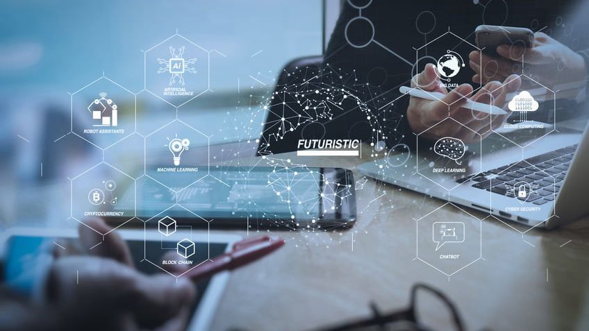 IT professionals collaborating with digital devices overlaid with futuristic cloud computing, AI, and data network graphics representing VMware Cloud Foundation (VCF) Advanced Infrastructure Portfolio Management.